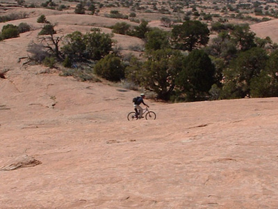 Kim Kelsey biking Poison Spider Mesa near Moab Utah