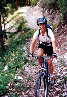 Lisa biking in the Gallatin Canyon