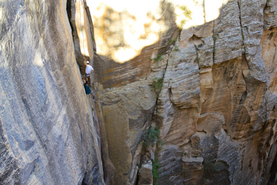 Bob on the 300 foot entry rappel into Englestead Hollow in Zion National Park