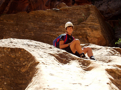 Lisa waiting on her turn to rappel through Pine Creek Canyon in Zion National Park