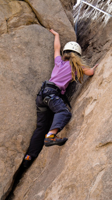 Hannah Potts learning to rock climb in Keyhole Canyon