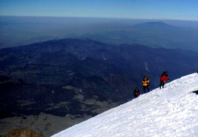 Mitch Newman, Tom Greider, and Jeff Michels near the summit