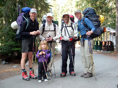 Hannah posing with her dad, Steve Hamilton, Rick Loop, and Ryan Bledsoe as they are about to leave White River Campground to climb Mount Rainier