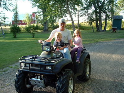 Riding Grandpa's 4-wheeler.