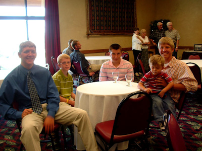 Caleb and his older boy cousins at Grandpa and Grandma's 50th wedding anniversary reception.